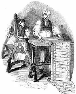 Sometimes: Preparing punched cards for a Jacquard loom. Card