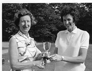 Policewoman: Presentation of cup to cricket team captain