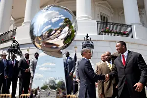 Professional Sports: President Barack Obama greets members of the Super