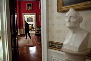 Deficit: President Barack Obama reads through his ?