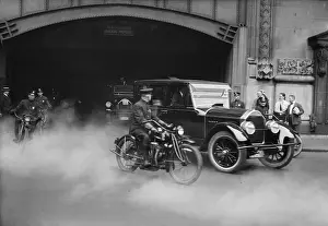 Presidents Wife: President Calvin Coolidge's car escorted by motorcycle