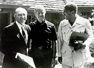 Resulted: President Carter with Begin and Sadat, Camp David