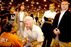 Katrina: President Bill Clinton greets an Katrina evacuee