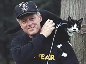 Lcgr1507: President Bill Clinton with Socks the Cat perched