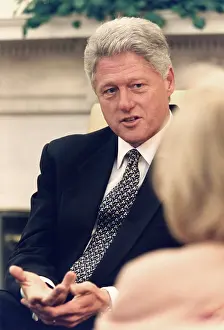 Dole: President Bill Clinton speaks with reporters in