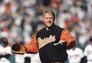 The Everett Collection: President Bill Clinton throwing out the first