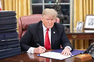 Lcgr1902: President Donald Trump signing documents on