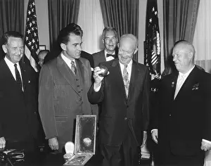 Herter: President Eisenhower holding a gift from Soviet