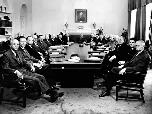 Ezra: President Eisenhower poses with his second ?