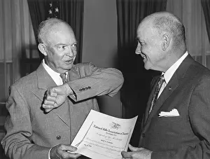 Lcgr1412: President Eisenhower receives a membership from