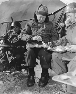 Implying: President-elect Dwight Eisenhower eating with