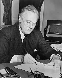 President Franklin D. Roosevelt signing ?