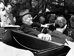 Debonair: President Franklin Roosevelt, debonair with ?