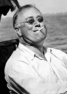 Tarpon: President Franklin Roosevelt smokes a cigarette ?