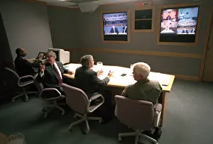 Teleconference: President George W. Bush in a multiscreen video
