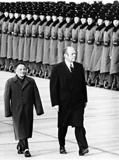 Deng: President Gerald Ford walks with China's ?