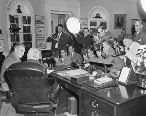 Acheson: President Harry Truman (back to camera) in the
