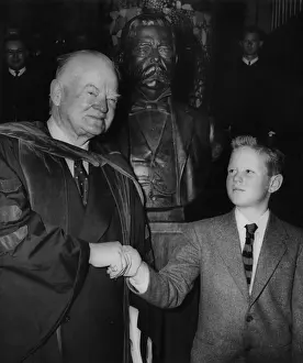 Westinghouse: Former President Herbert Hoover, shaking ?