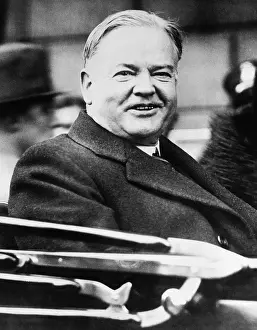 Open Car: President Herbert Hoover smiling from an open car