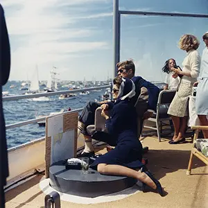 Smokin: President and Jacqueline Kennedy watch the ?