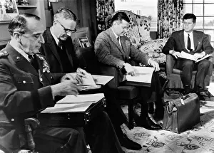 Lyman: President John Kennedy held a meeting with ?