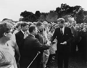 Idealism: President John Kennedy meets with one of ?