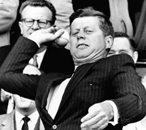 Pitching: President John Kennedy throws out the first ?