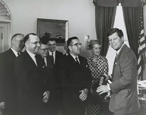 Gratitude: President Kennedy presenting the First Volumes