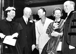 Grandsons: President and Mrs. Eisenhower (left) talk ?