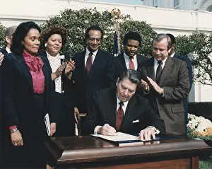 Cornelia: President Reagan signing House Resolution ?