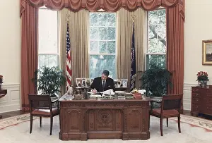 Reagan Na: President Reagan working at his desk in ?