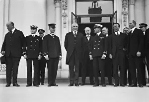 Denby: President Warren Harding and a group including men