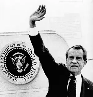 Exits: The Presidential Seal at his shoulder for ?