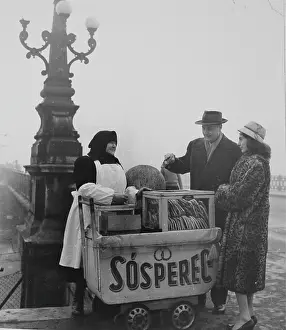 Peddlers: A pretzel seller in Budapest. 1955