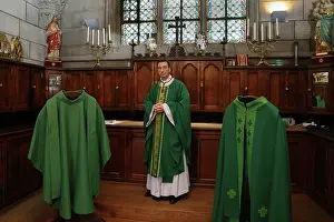 Chasuble: Priest preparing for mass, Sacristy, Cathedrale