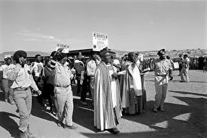 Cradock: Priests lead the coffin procession of the Cradock