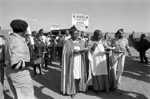 Cradock: Priests lead the coffin procession at the funeral of