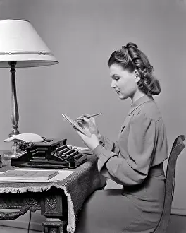 Editing: Prim and Proper Young Woman at Home Studying Practicing