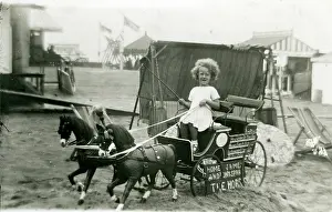Fairground: Primative Fairground/Beach Amusements - Girl on buggy