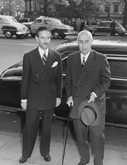 Exporters: Prime Minister Mossadegh of Iran (right) during