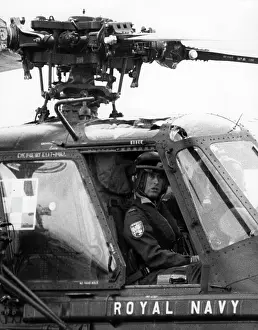 Piloting: Prince Charles piloting a Royal Navy helicopter