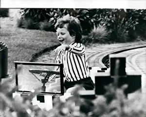 Margarethe: Prince Frederik of Denmark riding in a mini car