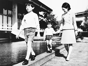 A Line: Princess Michiko, walking with her two sons, Prince
