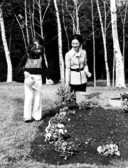 Michiko: Princess Nori waters the grounds of the ?