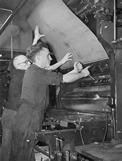 Printers: Printer at a printing press, 1941