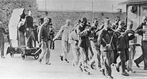 Mauthausen: Prisoners are forced to give company