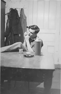 Tedder: Private Tom Tedder playing the harmonica WW2