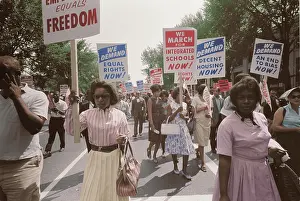 Minority: A procession of African Americans carrying
