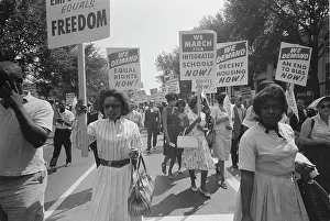Minority: A procession of African Americans carrying