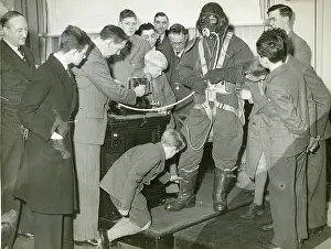 Adelphi: Professor G.T.R. Hill demonstrating a Sidcup flying suit